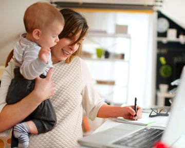 XYPN-woman-with-baby-working-at-laptop-reverse