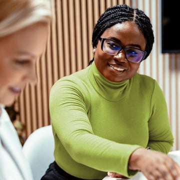 Woman advising client confidently