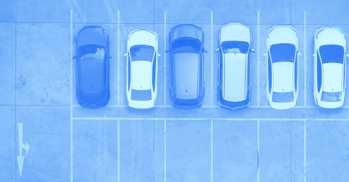 Top-down view of five cars parked next to each other.
