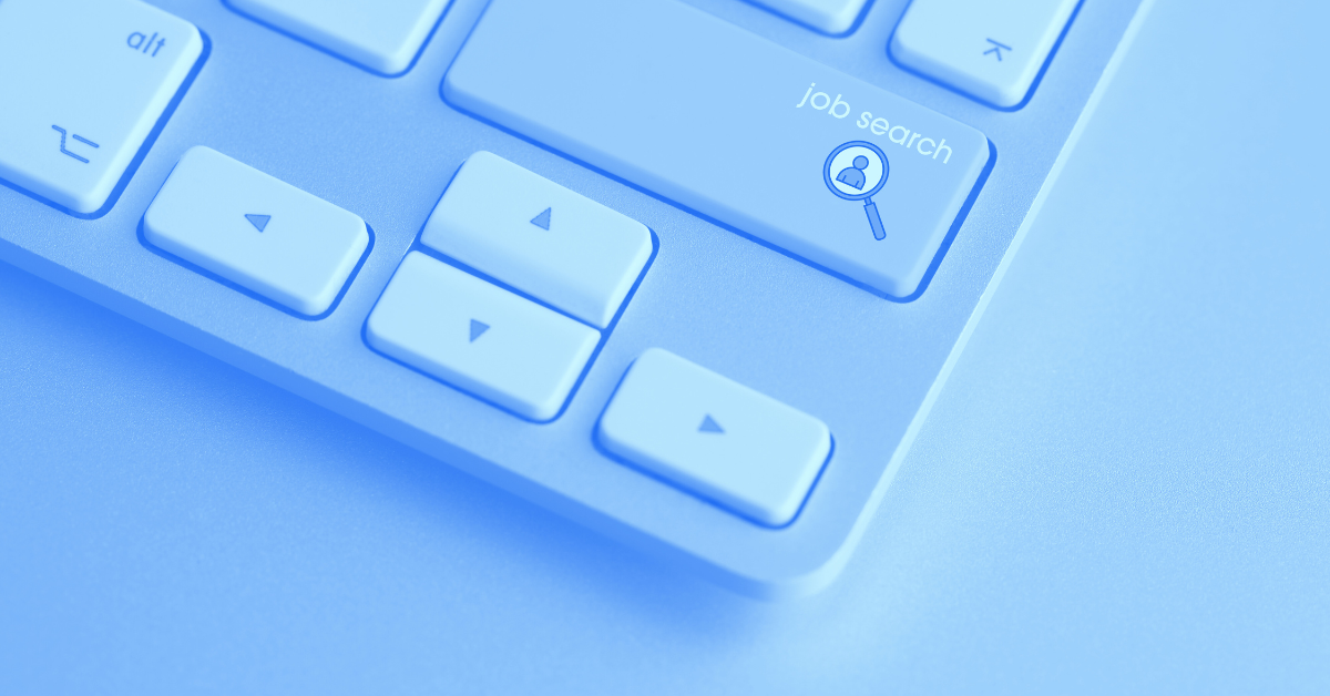 Close-up of enter key on keyboard. Text says Job Search instead of Enter